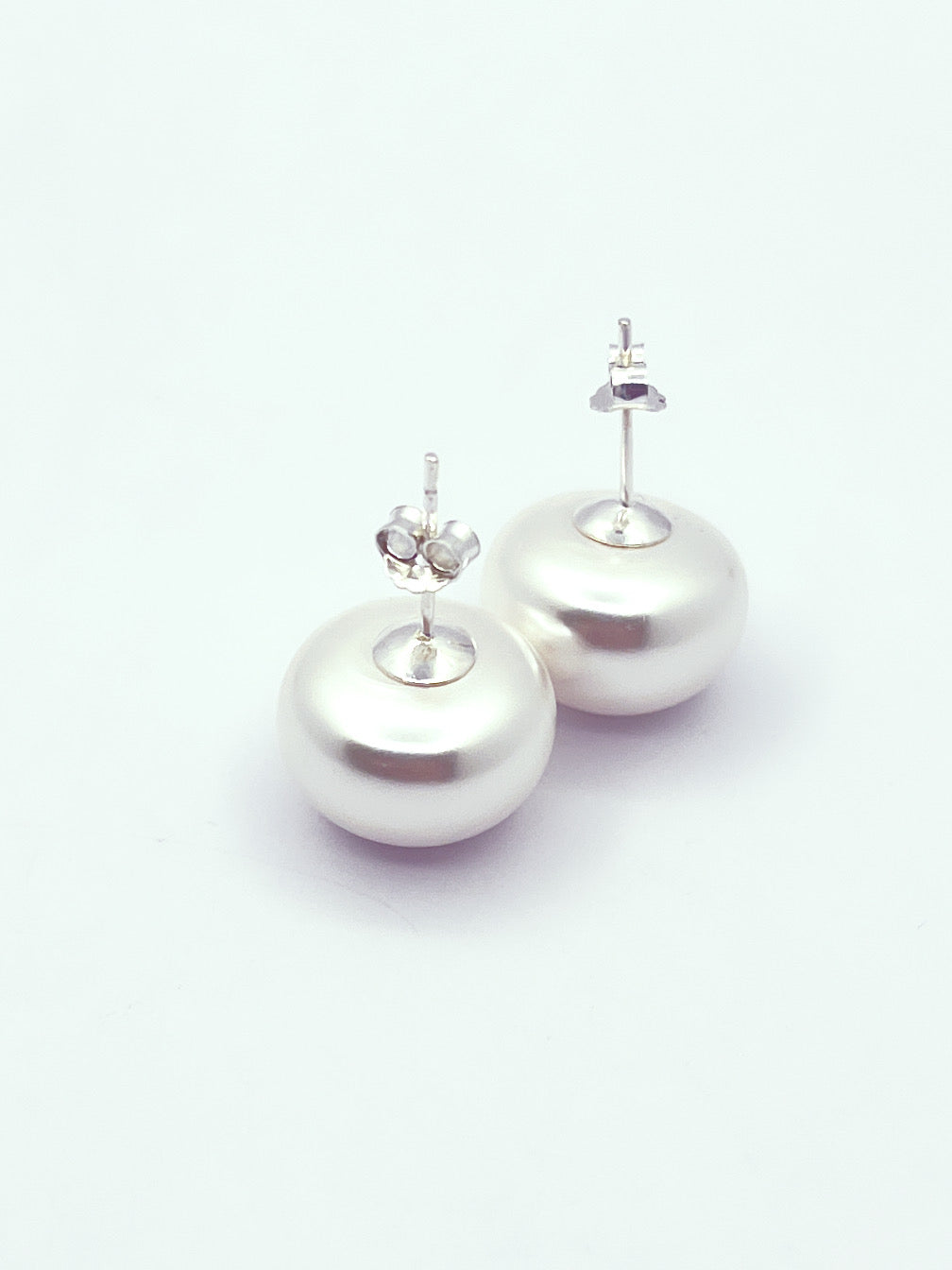 Aros perla blanca base plata