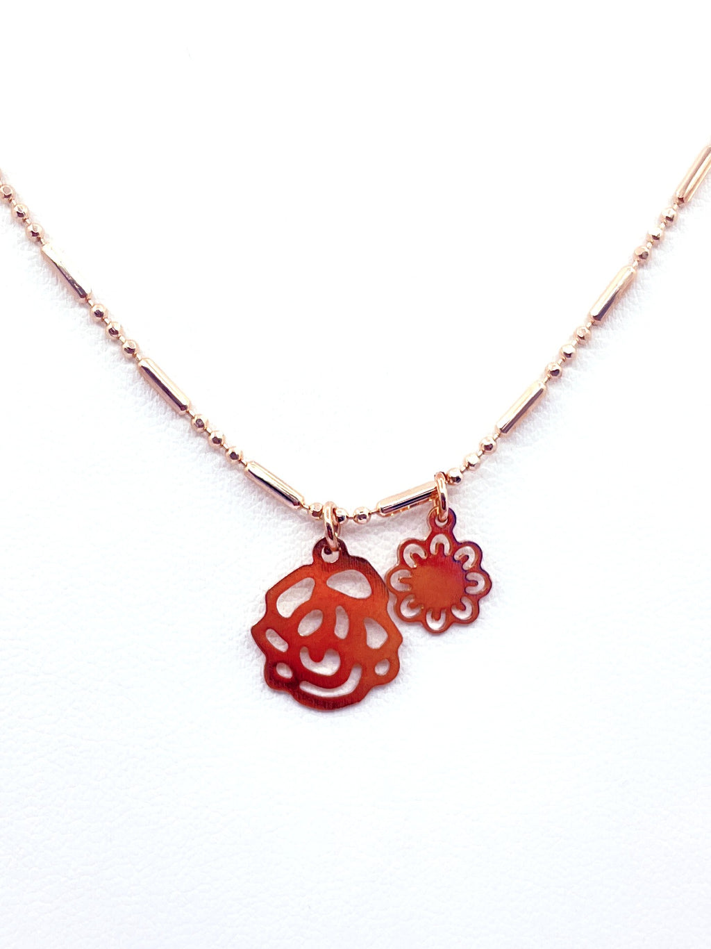 Collar florcitas baño oro rosado
