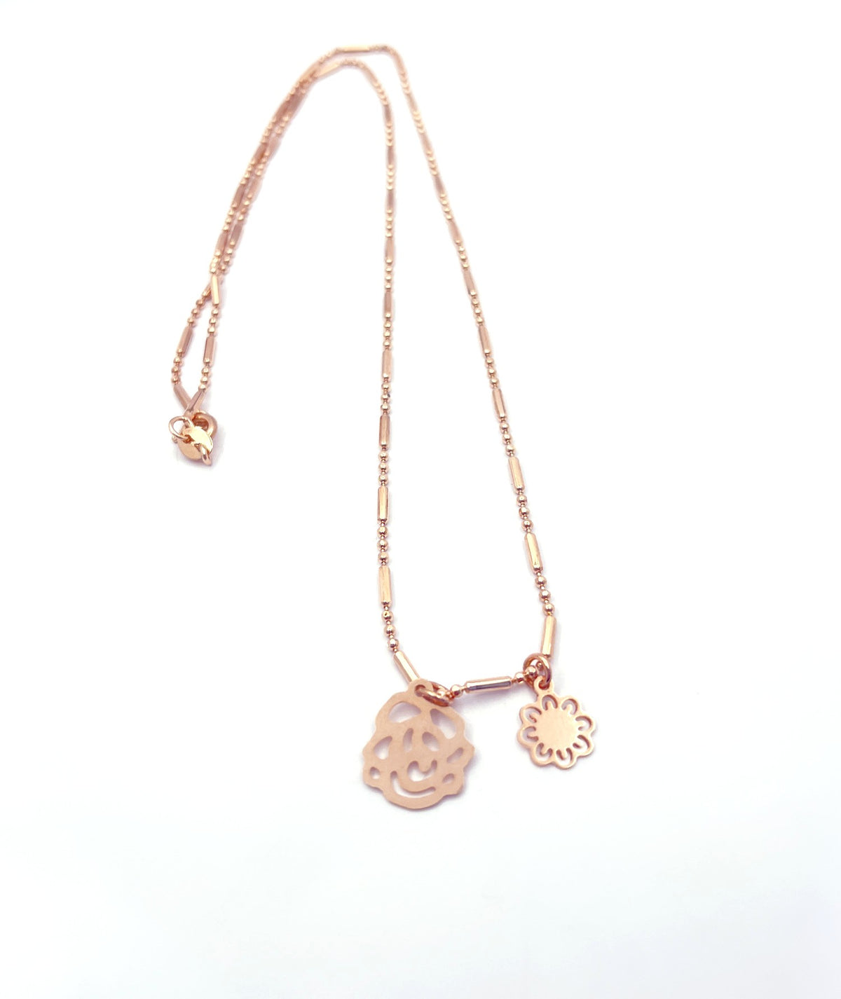 Collar florcitas baño oro rosado