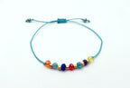 Pulsera de cristales de los siete chakras, macramé y baño de oro amarillo