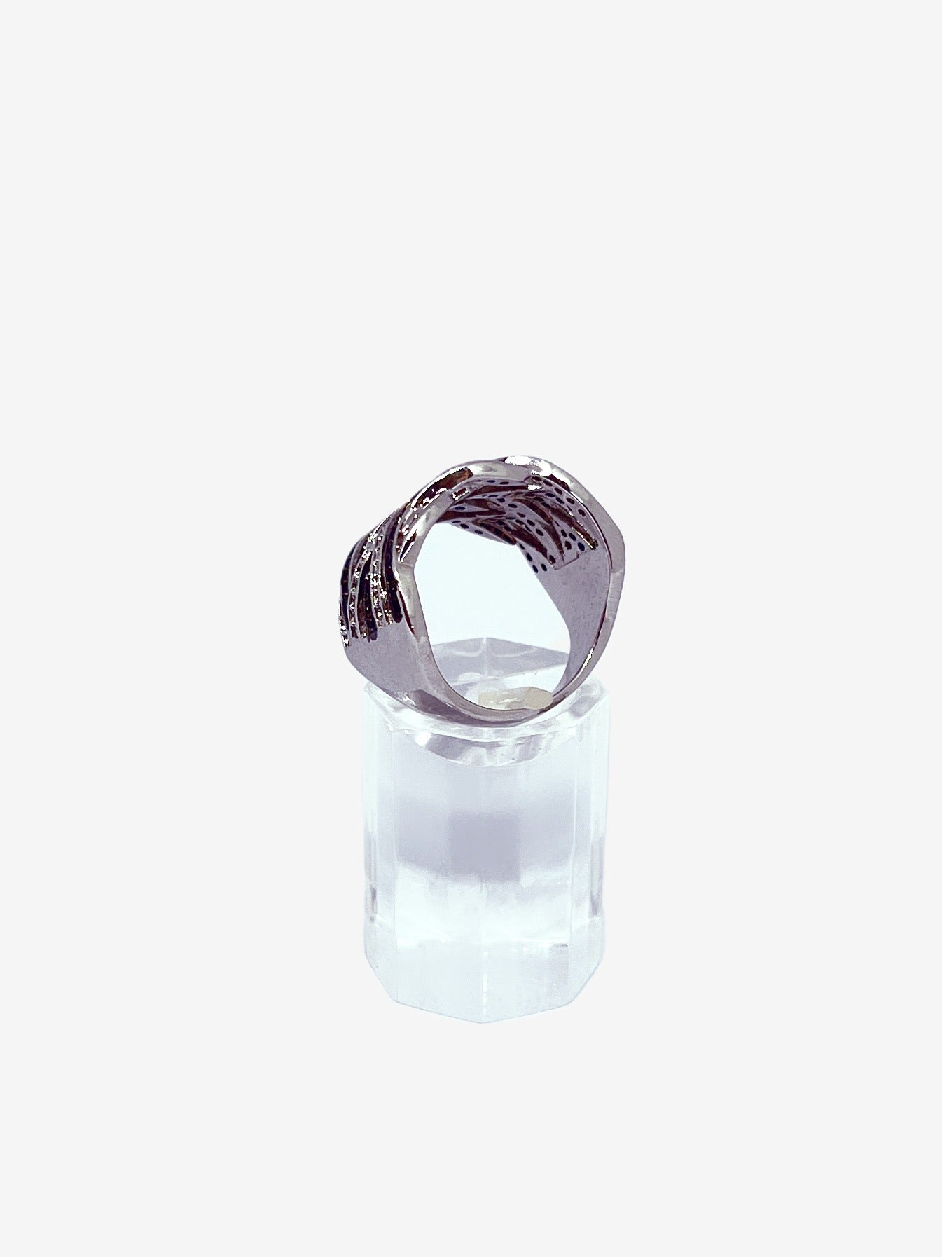 Anillo baño oro blanco y microcircones onix trenzado