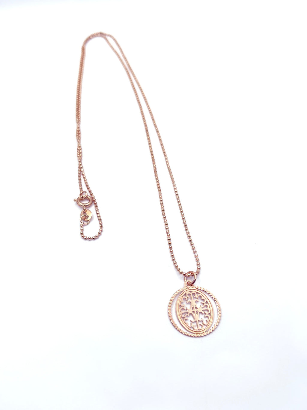 Collar mandala baño oro rosado