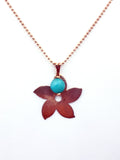 Collar flor y piedra natural baño oro rosado