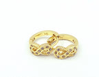 Argollas Huggie infinito con microcircones, baño de oro amarillo, 14 mm
